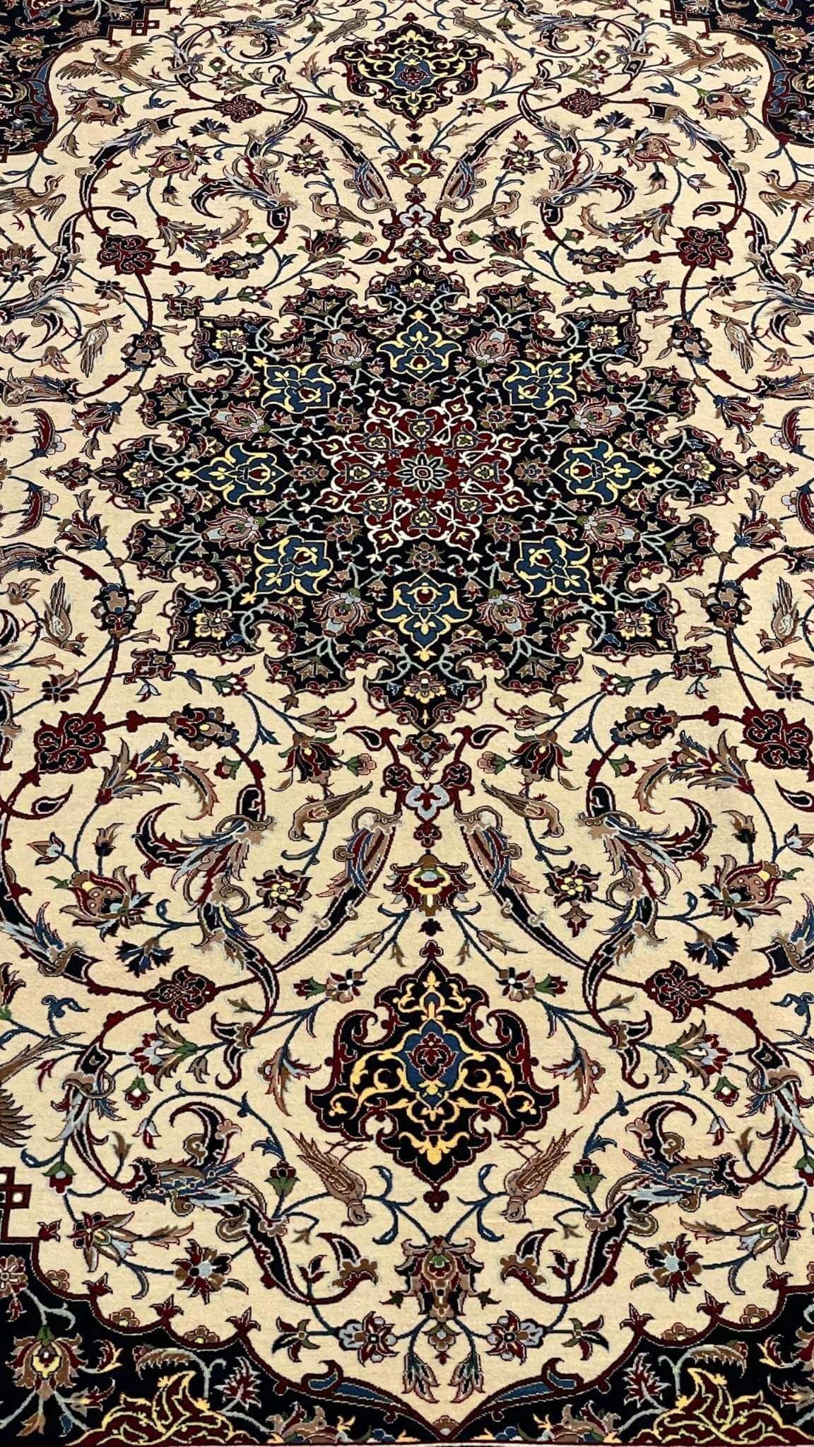 Master Bagher Seirafian rug in vibrant cream and black tones, framed with a detailed floral border.